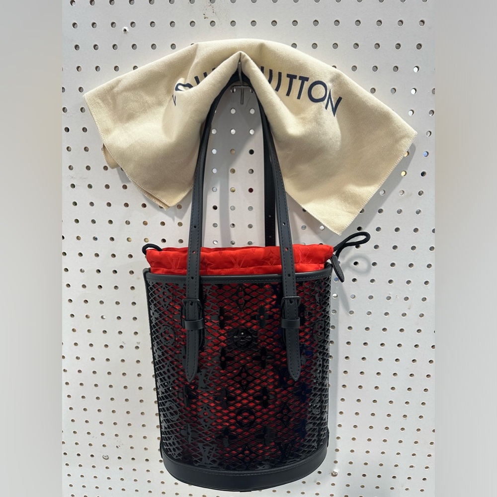 NWT Limited Louis Vuitton Black See Thru Bucket Bag with Red Interior Pouch.